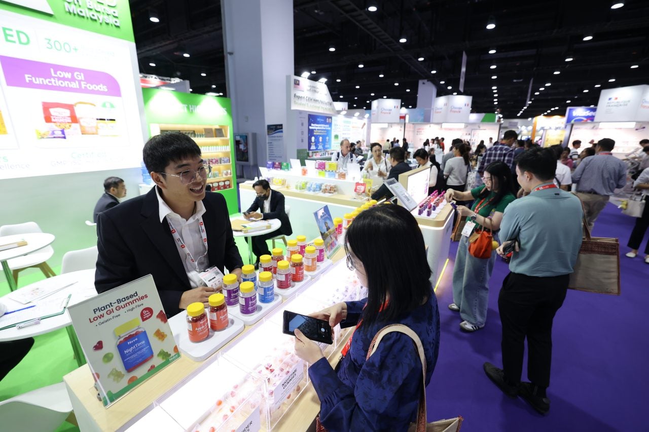 Attendees enjoying and tasting products at Vitafood Asia